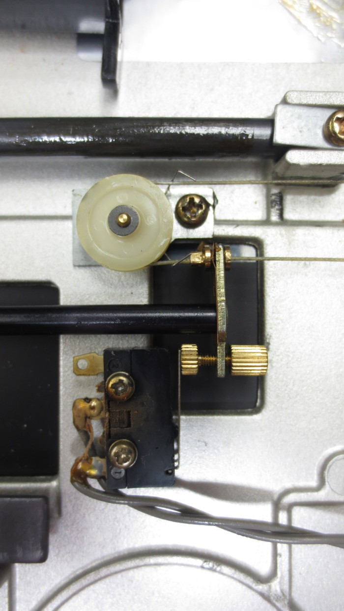 Technics SL 10 Turntable - A detail of the stop-switch (there are two of these); these allow the technician to adjust the exact moment when the arm descends and reruns, at the beginning and end of an LP.